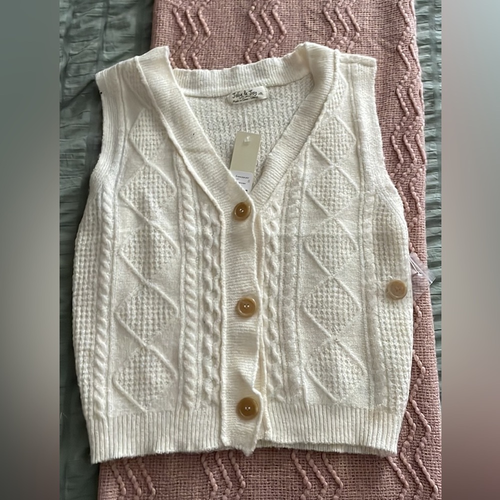 Francesca’s button-up sweater vest